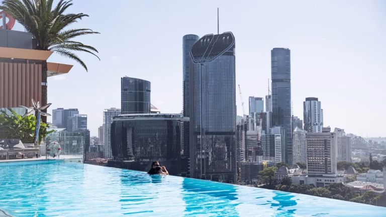 Murray and our daughter in the infinity pool shallow strip, Emporium Hotel South Bank reviews