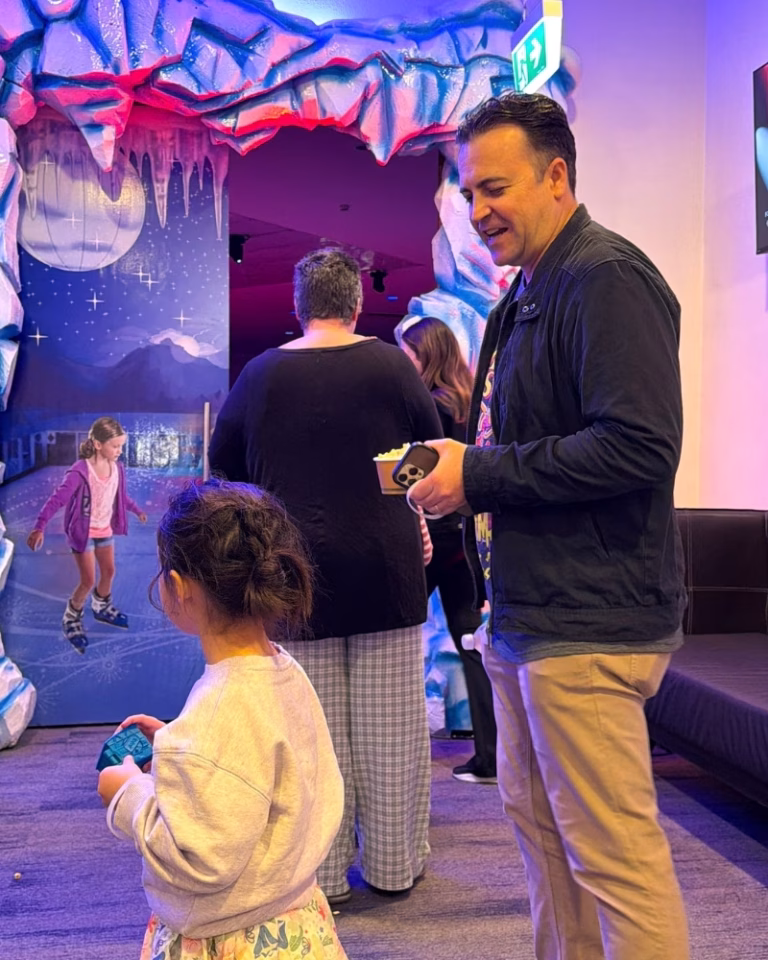 Murray and his daughter at the entrance to Planet Chill ice skating rink, where Rock on Ice is performed, Paradise Resort Gold Coast