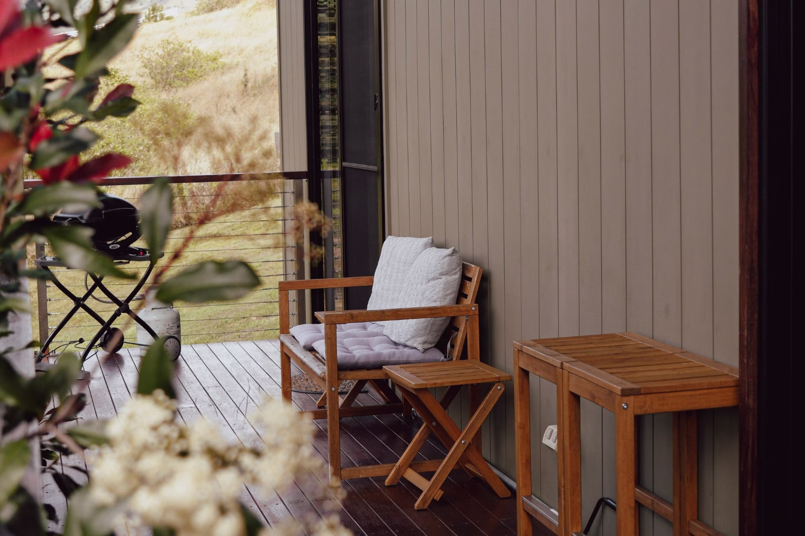 Verandah bench at Widgee Cottage looking out over paddocks and mountains, Scenic Rim accommodation with a view at Worendo Cottages